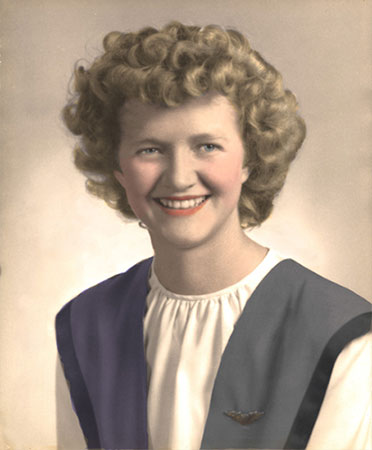 This portrait was the favorite photograph the client had of his beloved deceased wife. He wanted the photo colorized in the style of the era in which it was taken. The photo on the right is the finished product. Carol colorized the image in authentic 1940s style. Note the pride with which this lovely WWII veteran displays her wings.